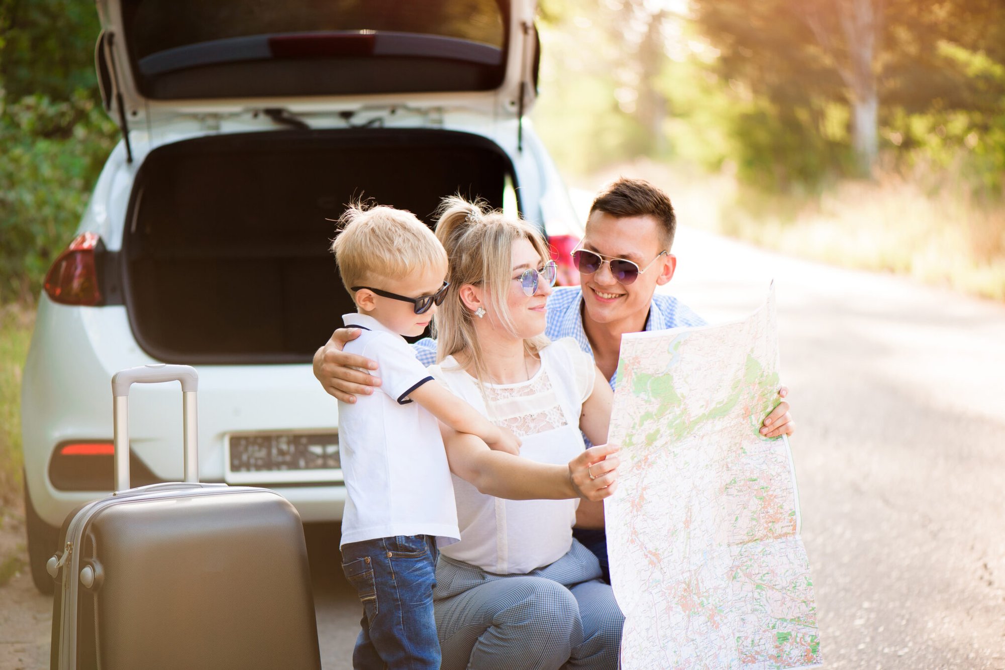 happy-family-enjoy-car-trip-summer-vacation-2048x1367